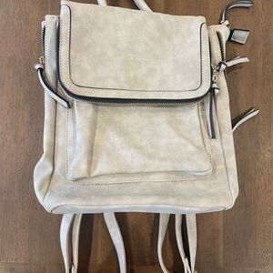 Elegant putty Backpack lots of storage pockets
